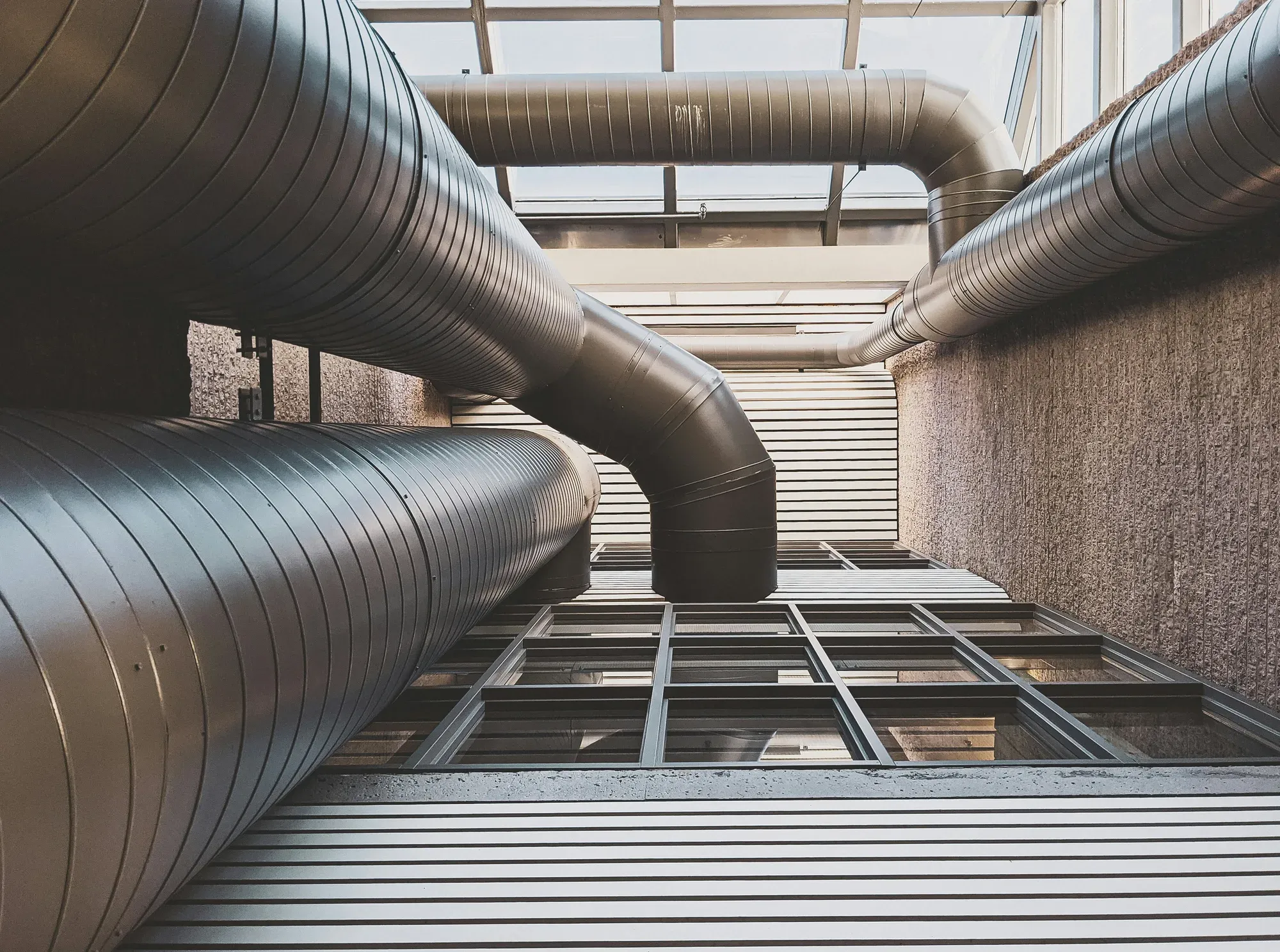 Spiral ductwork in a building plant space